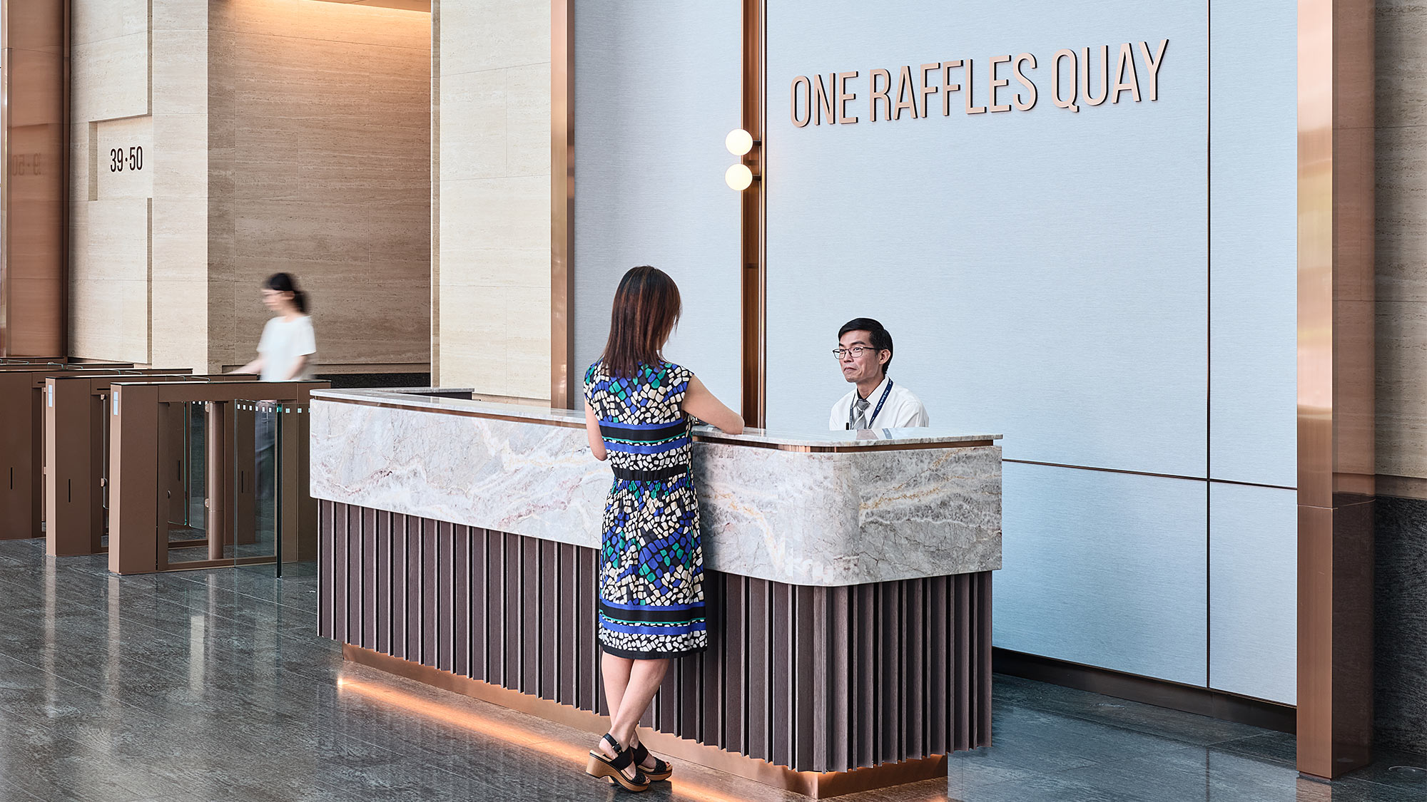 A woman standing at a podium.