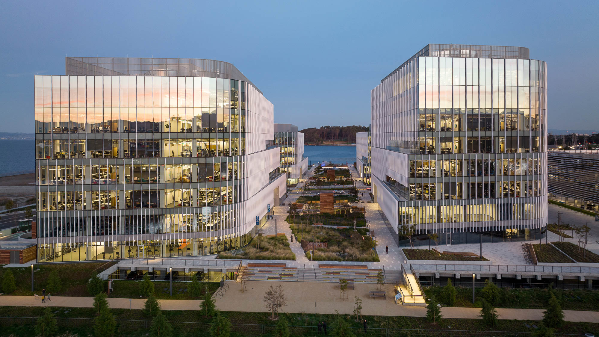 A couple of large buildings with windows.