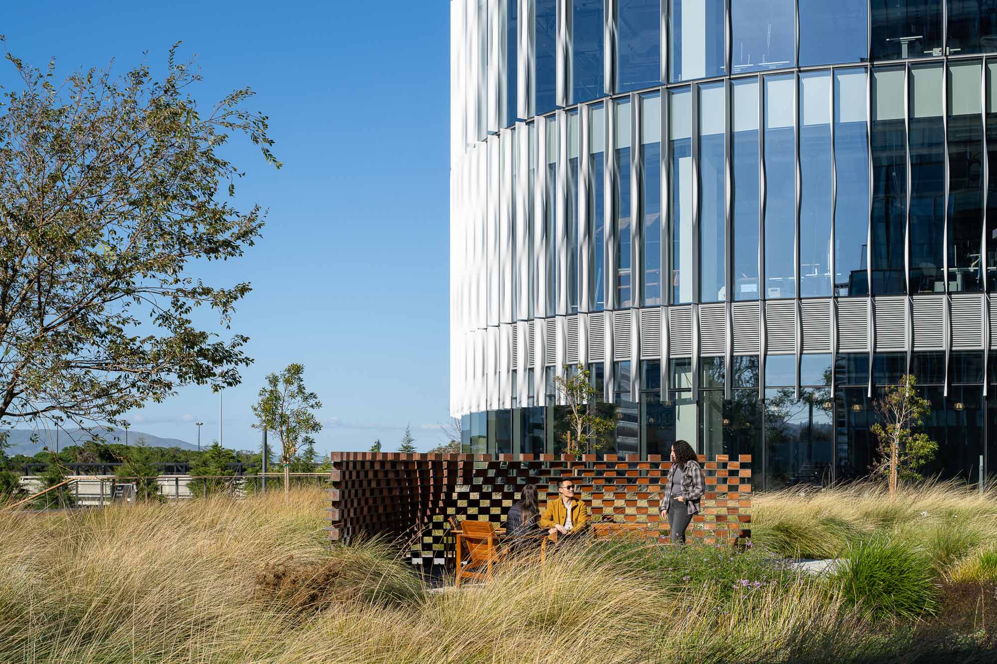 A few people outside a building.