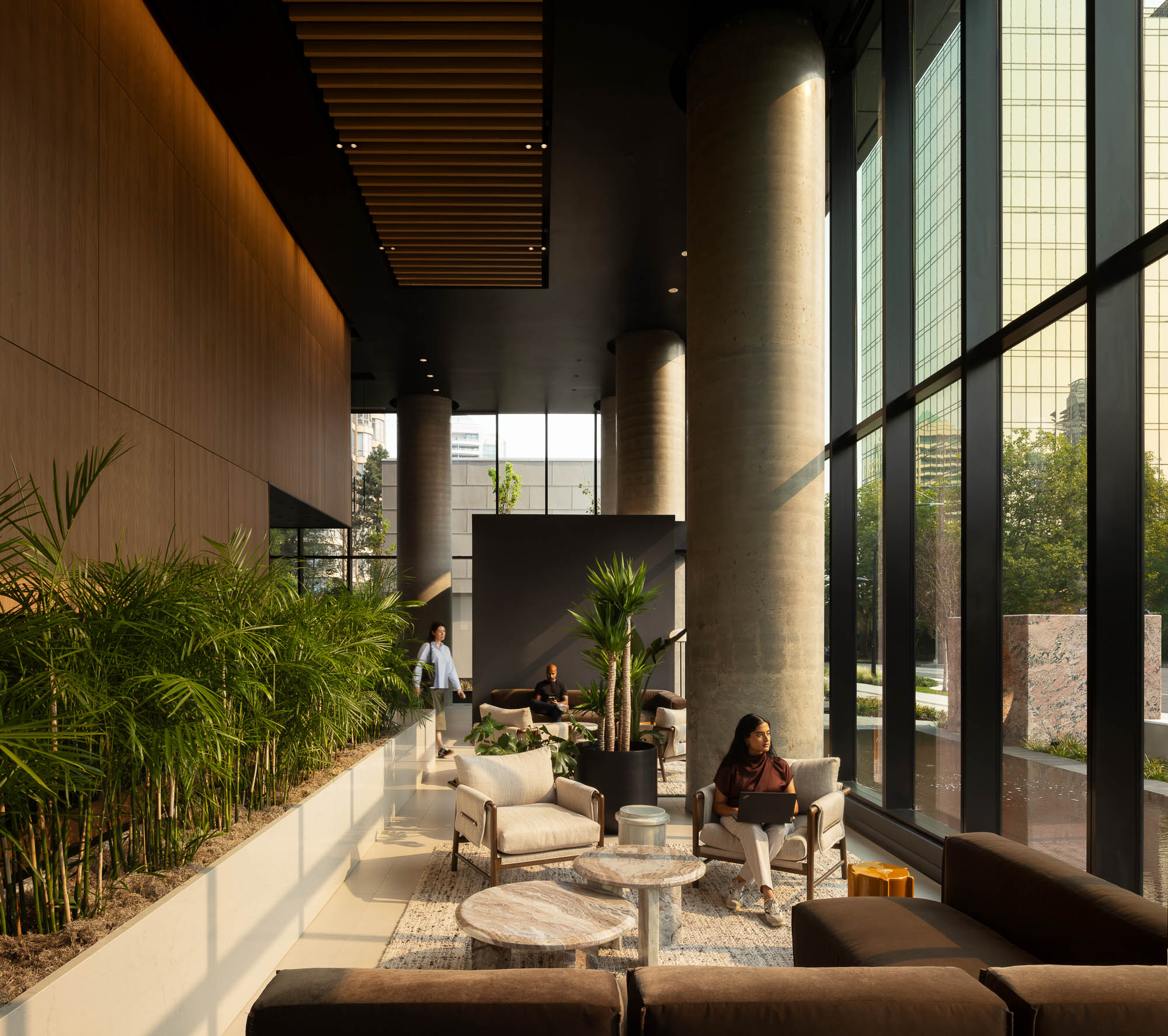 A person sitting on a chair outside.