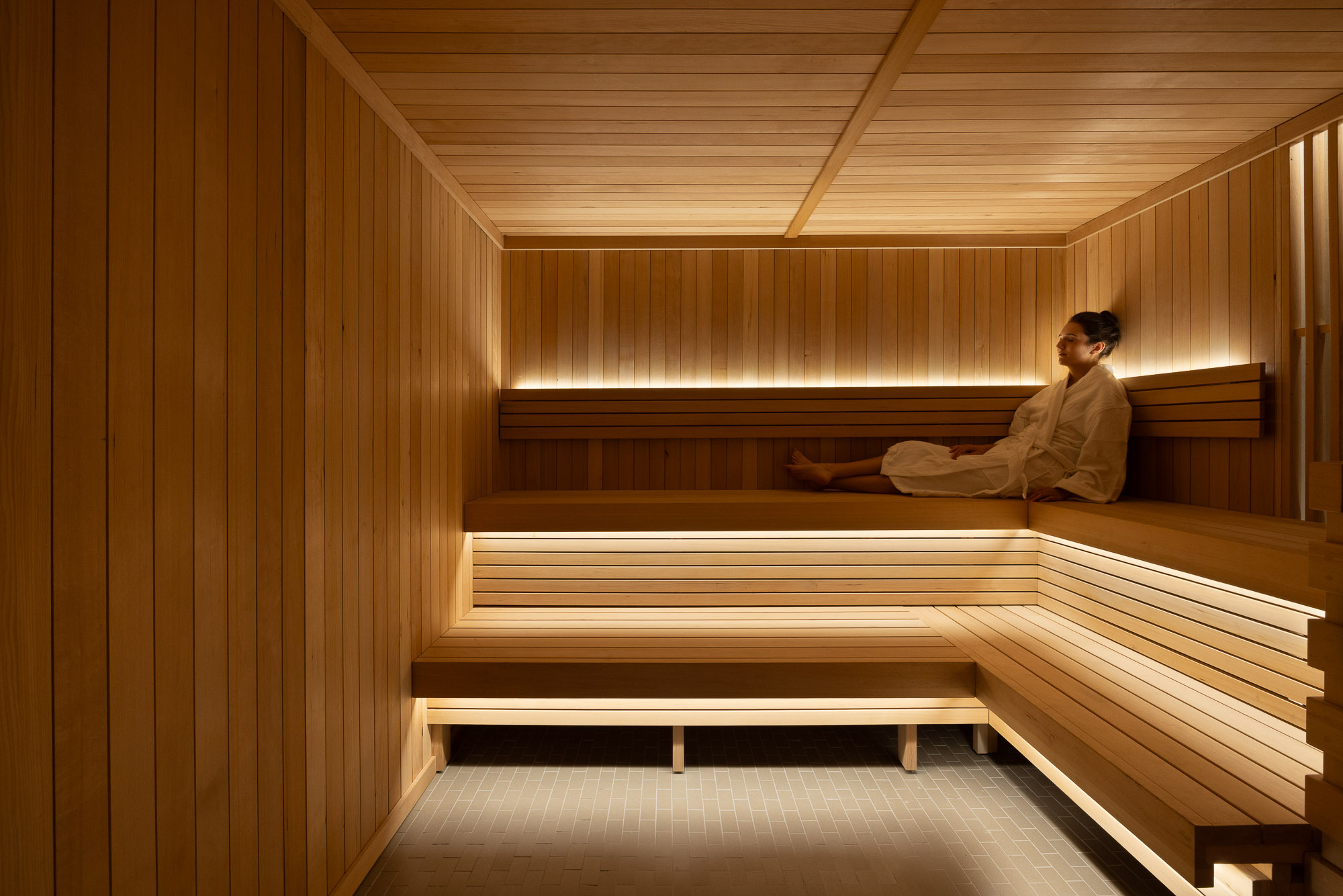 A person sitting on a bench.