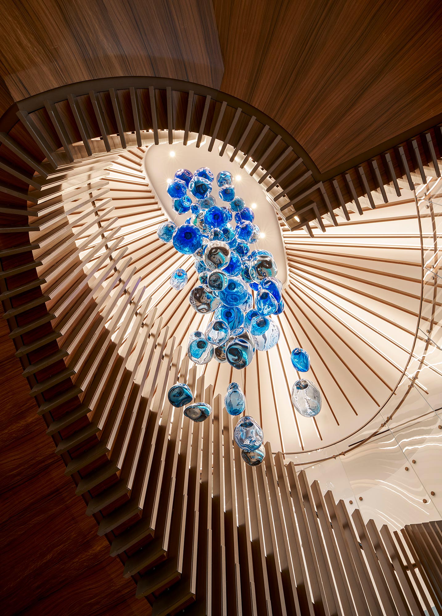 A chandelier with many blue lights.