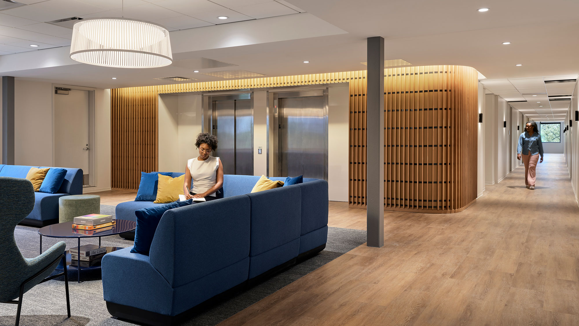 A person sitting on a couch.