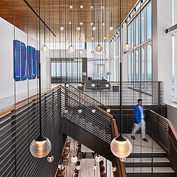 A person walking down a flight of stairs.