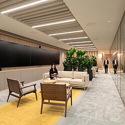 A person sitting on a couch.