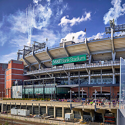 A stadium with a large crowd.