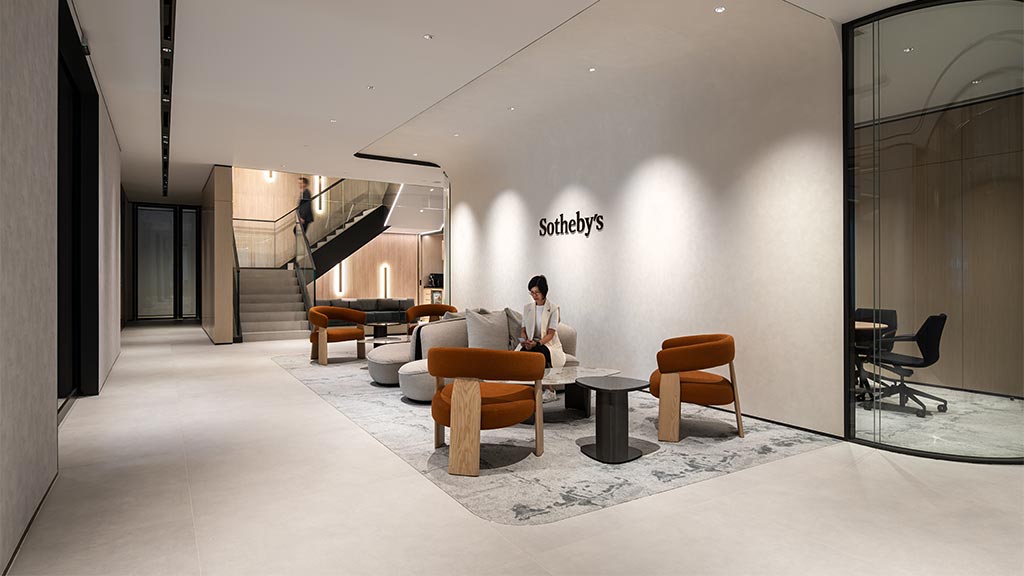 A person sitting on a couch.