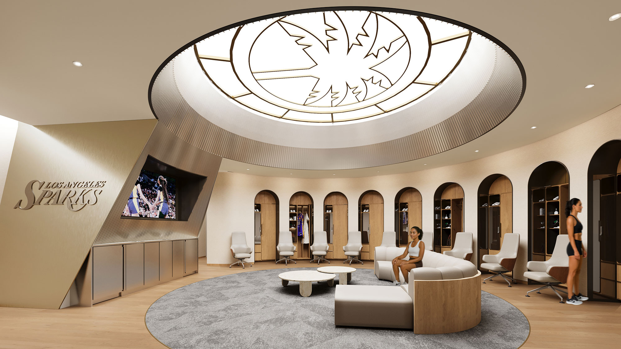 A room with a large screen and a couch and chairs.