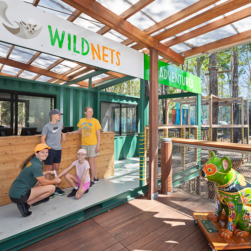 A group of people in a library.