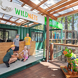 A group of people in a library.