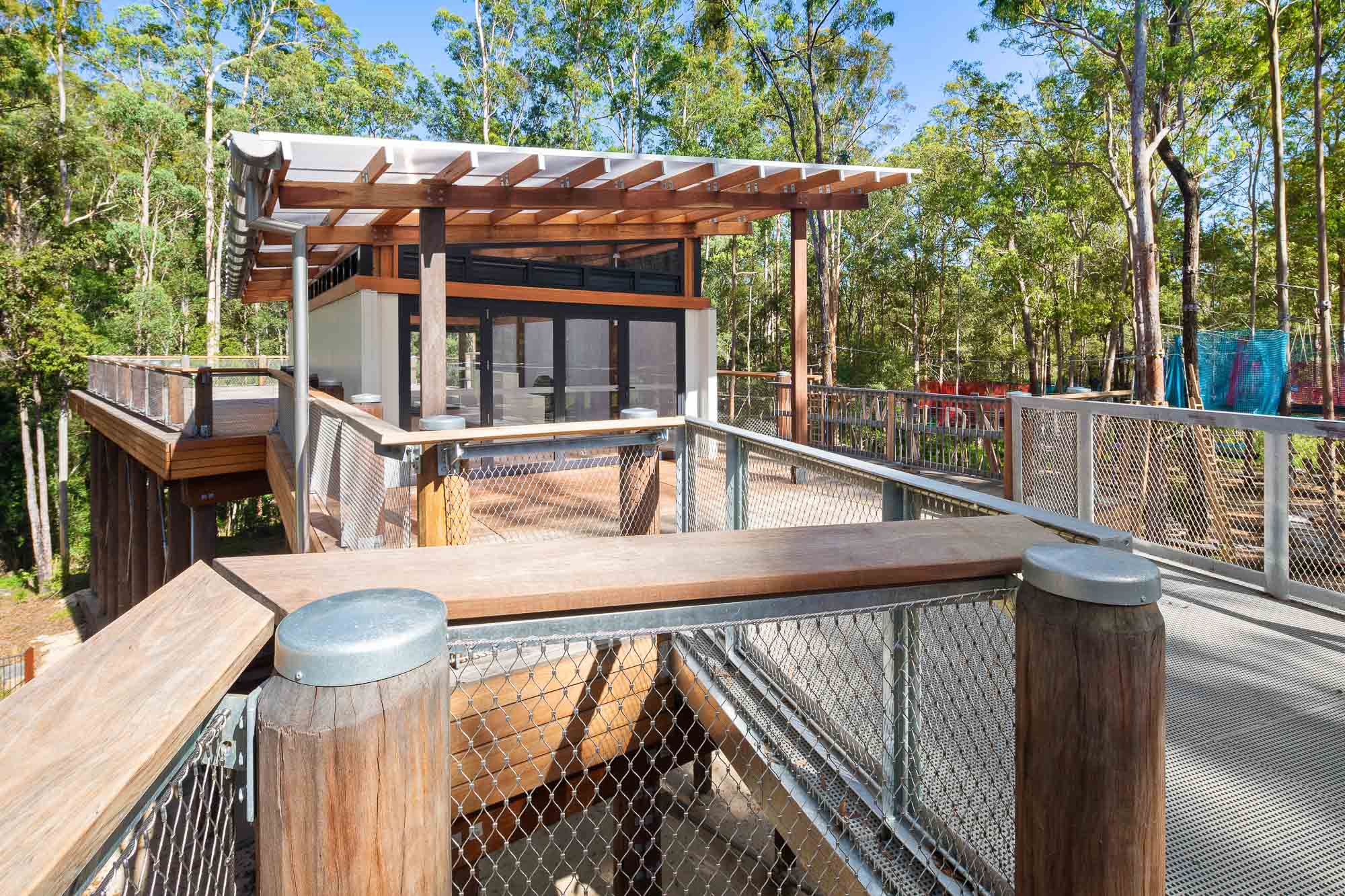 A wooden structure with a roof.