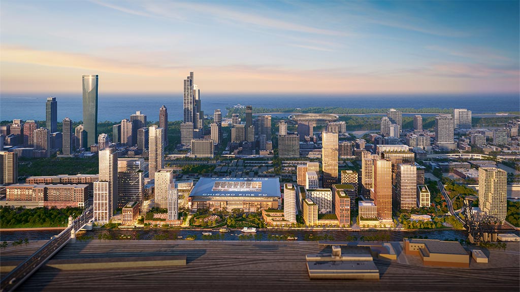 A city skyline with a body of water in the foreground.