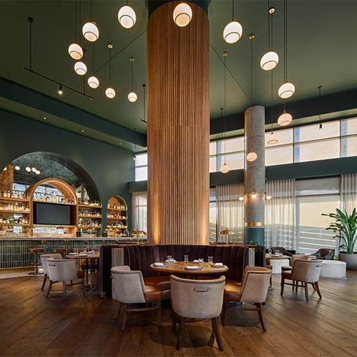 A room with tables and chairs.