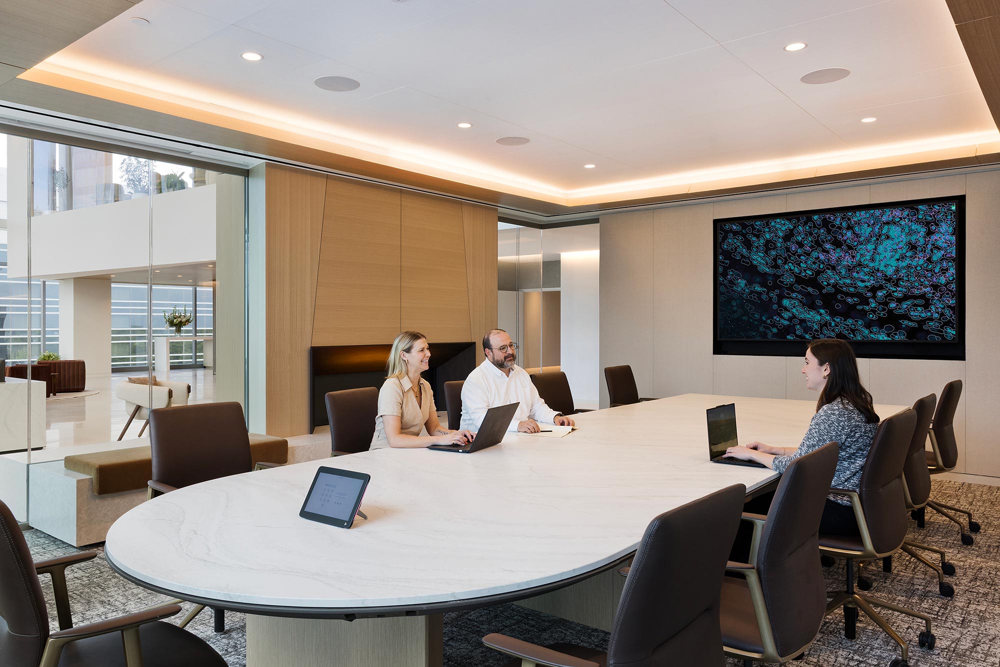 A group of people sitting around a table.