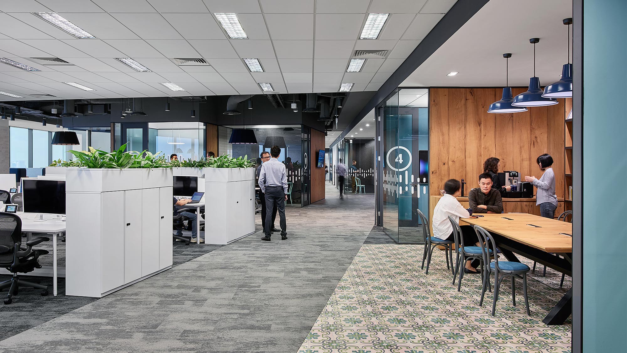 A group of people in an office.