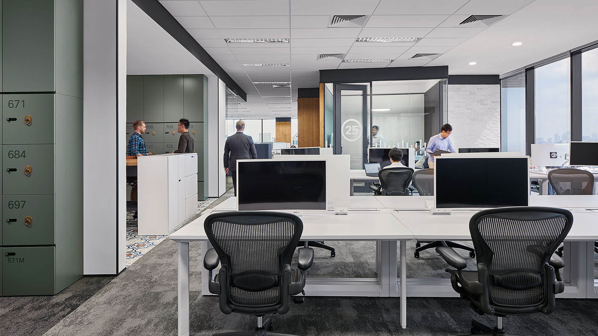 A group of people in an office.