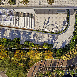 A large building with a bridge.