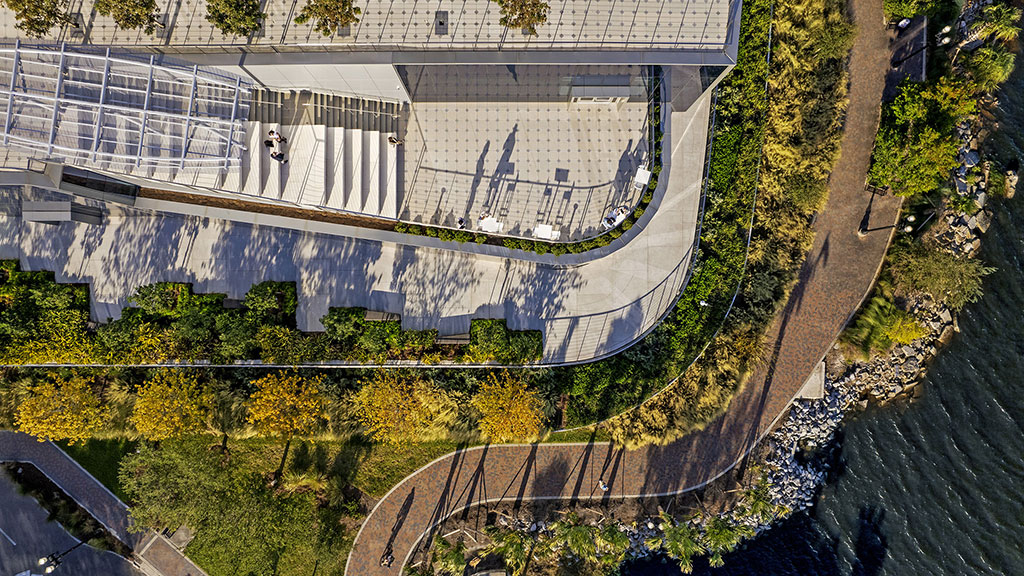 A large building with a bridge over it.