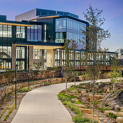 A building with trees in front of it.