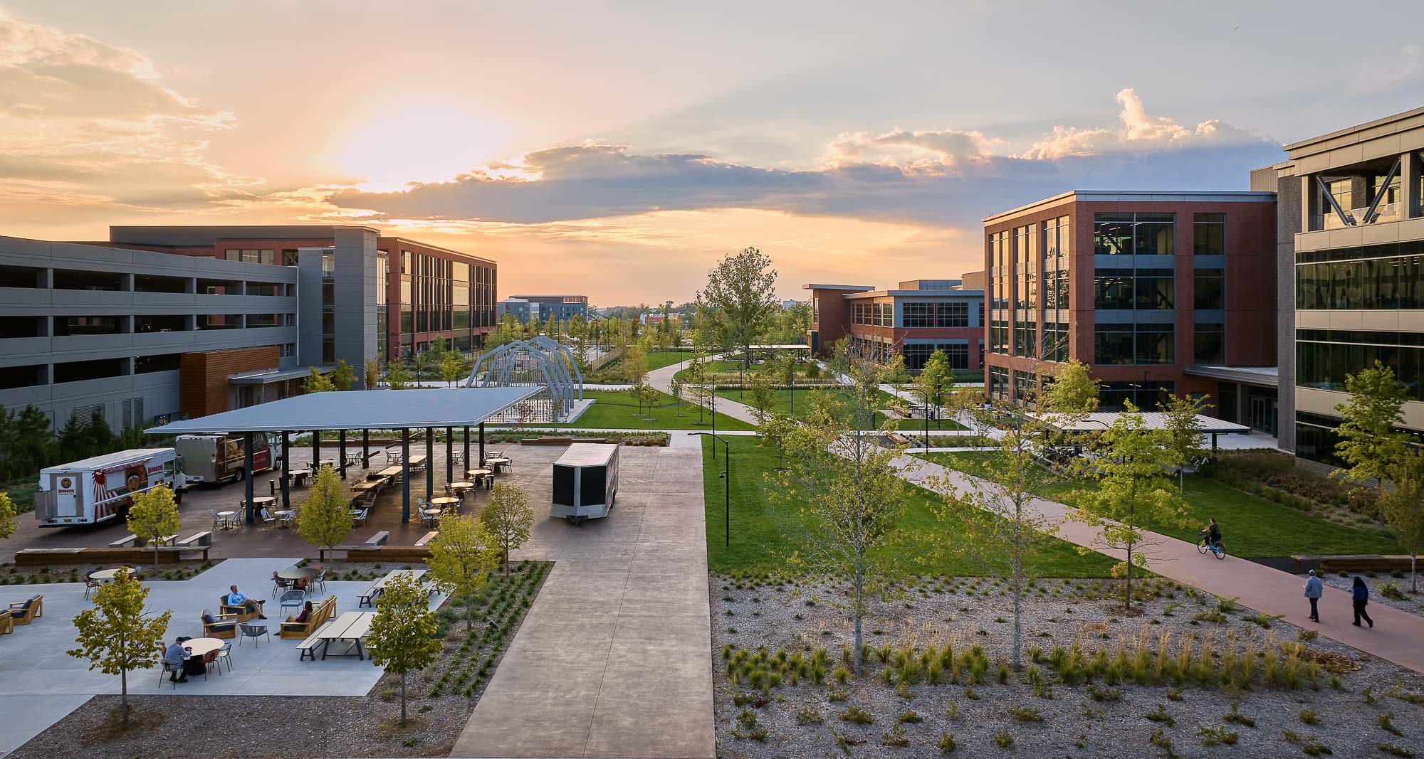 A courtyard with buildings and trees.
