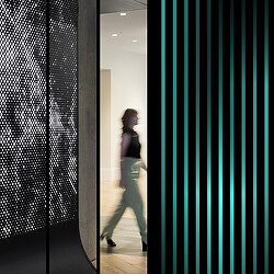 A person walking through a hallway.