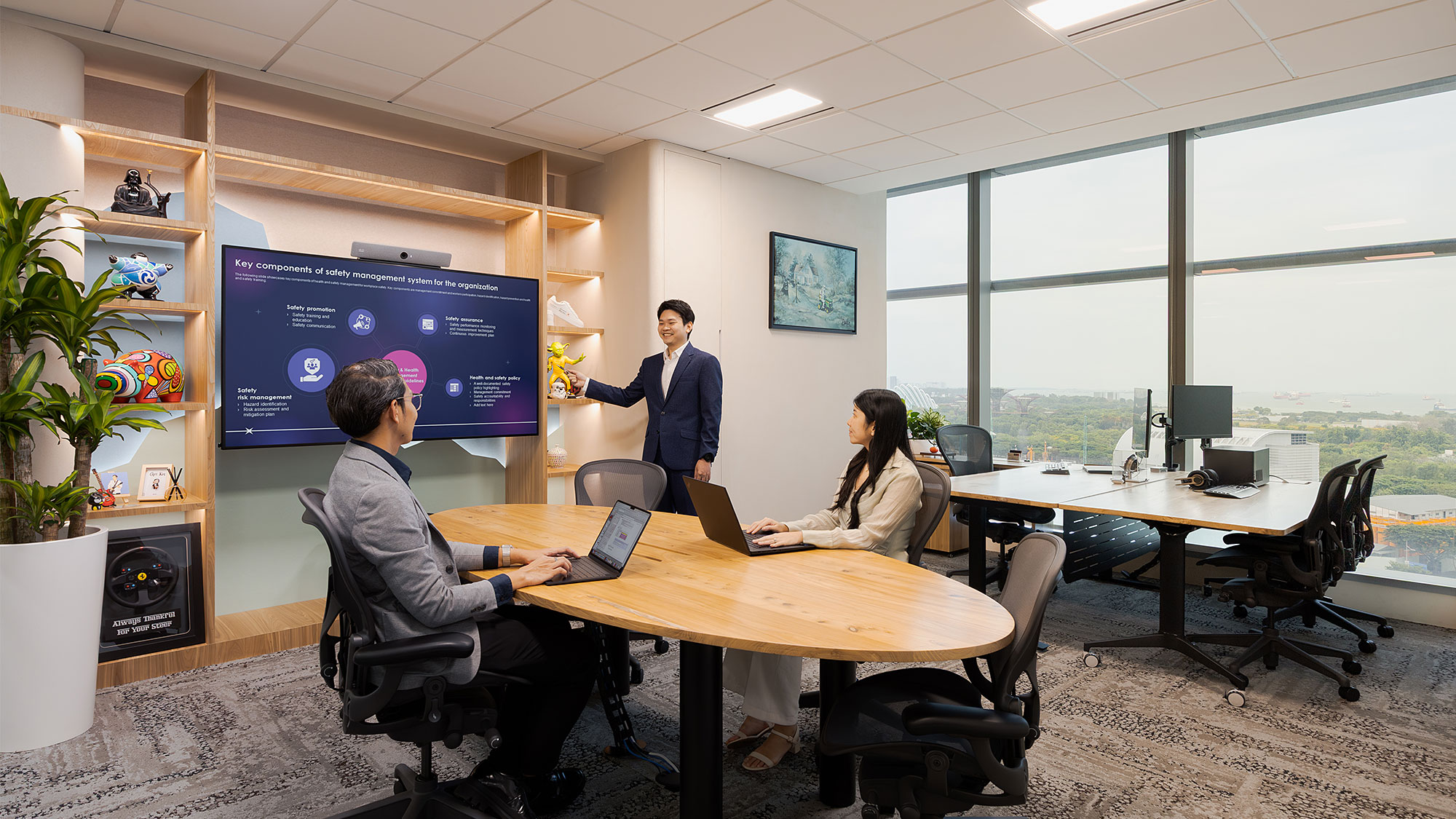A group of people in an office.