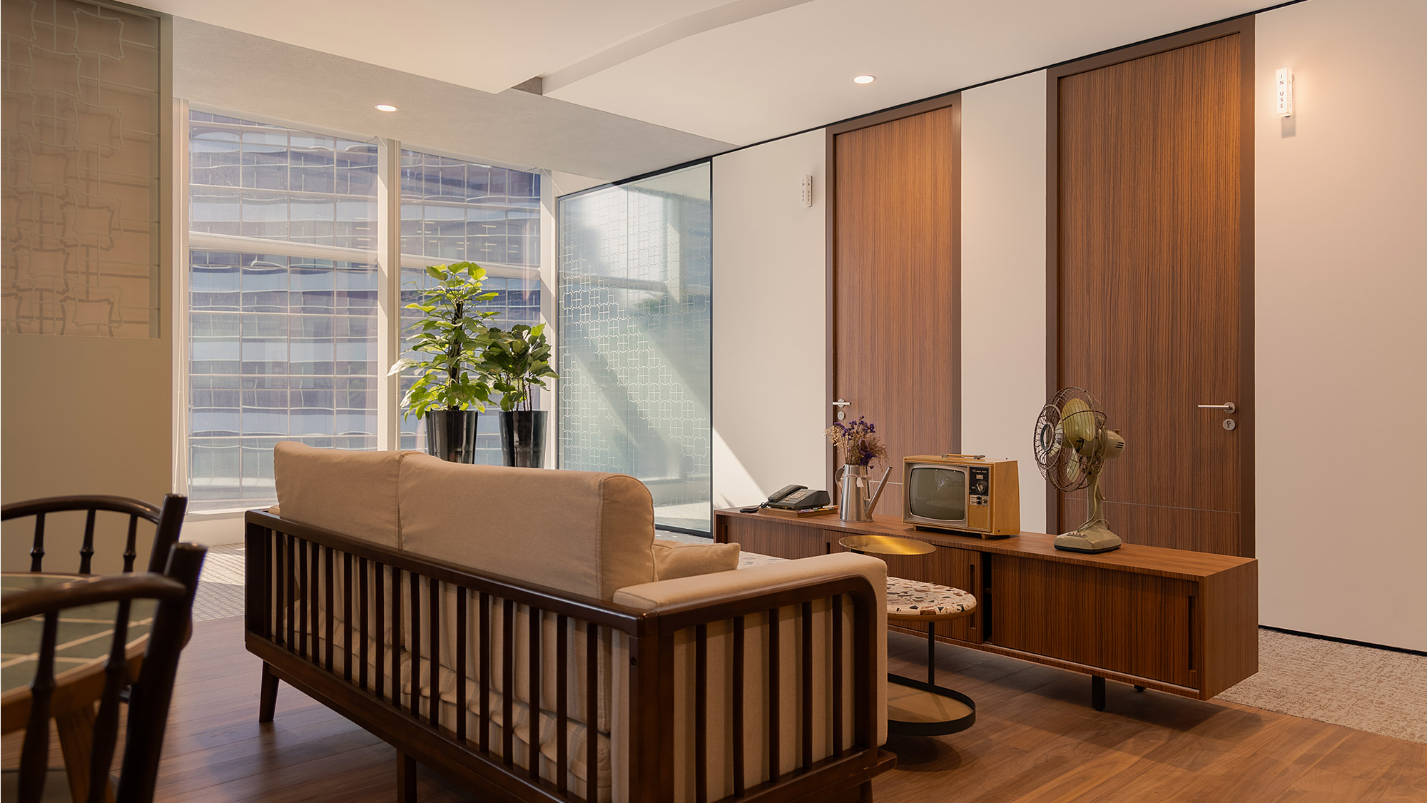 A living room with a large window.