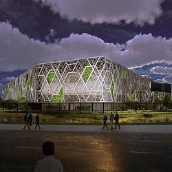 A group of people walking in front of a large building with a large glass dome.