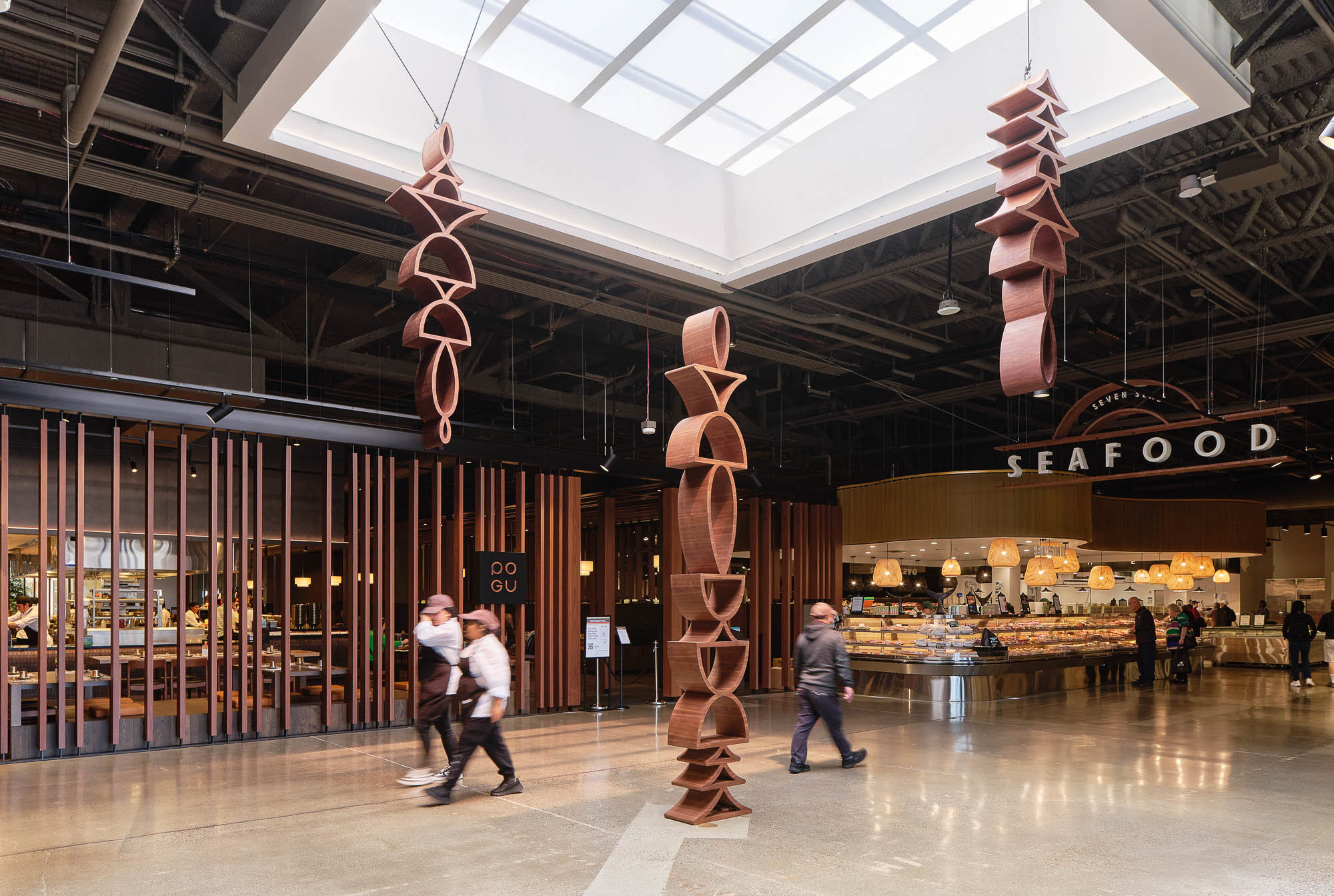 People walking in a large building.