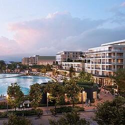 A body of water with buildings around it.