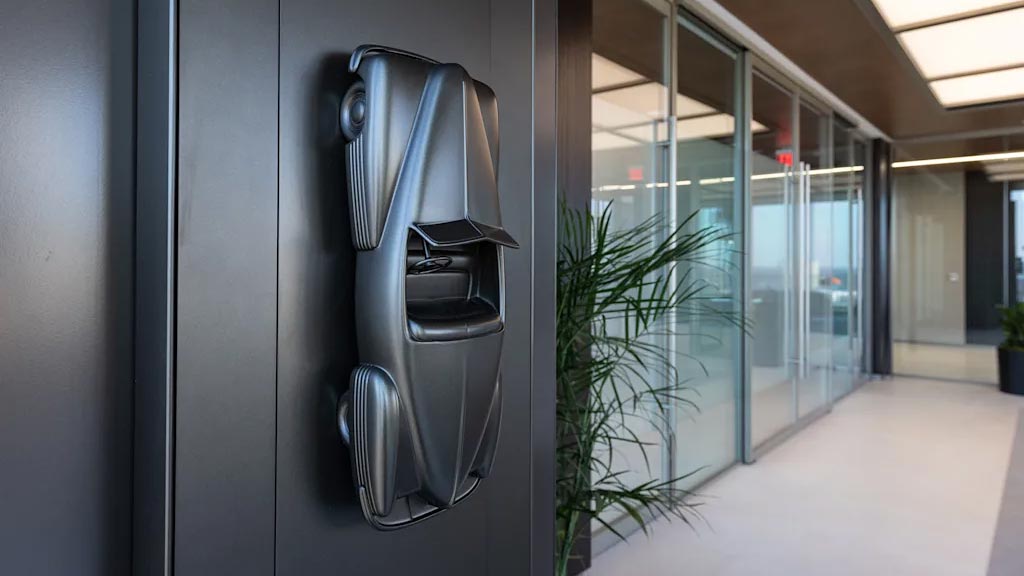 A room with a glass door and a plant in it.