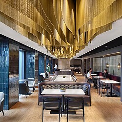 A room with tables and chairs.