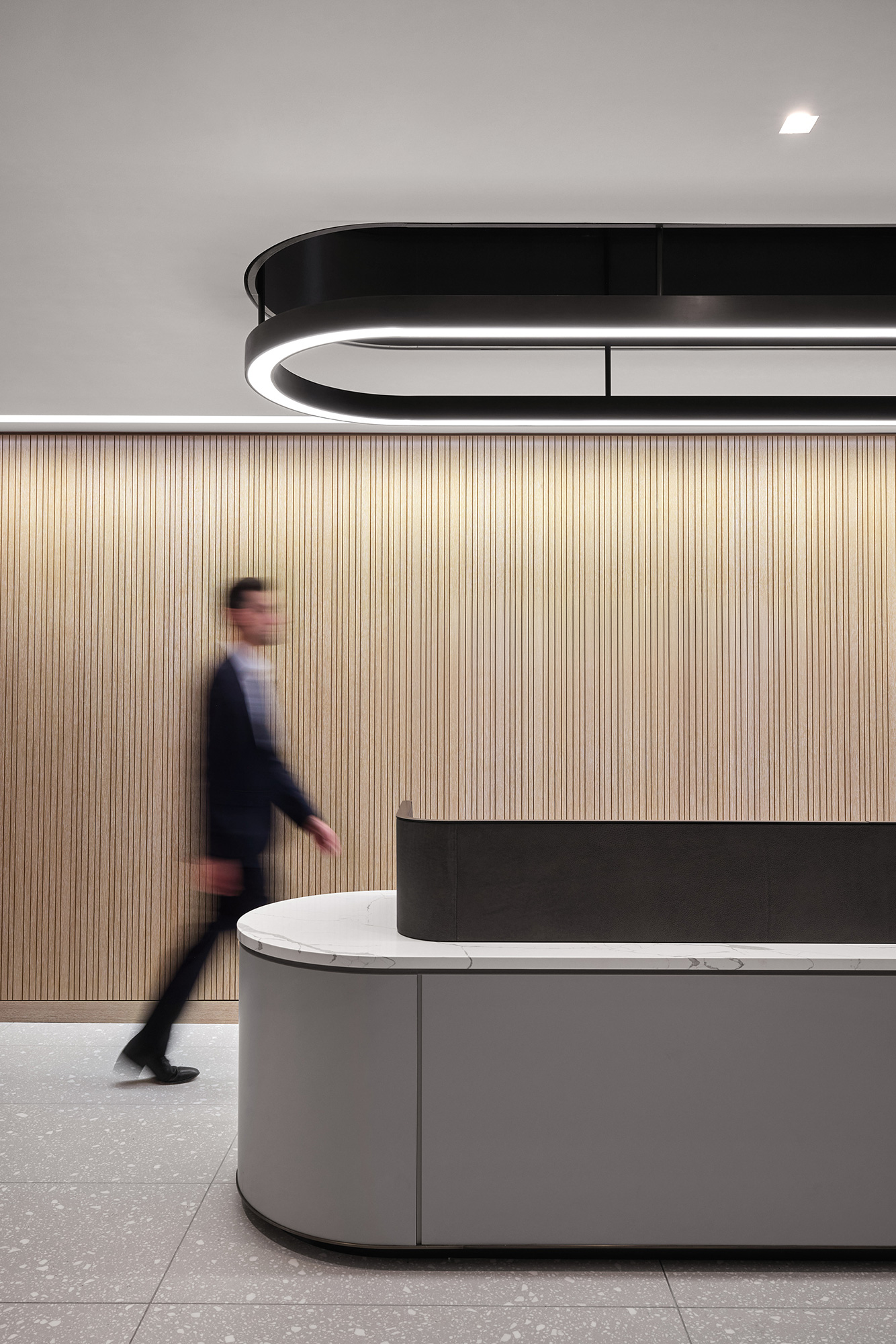 A person walking in a room.