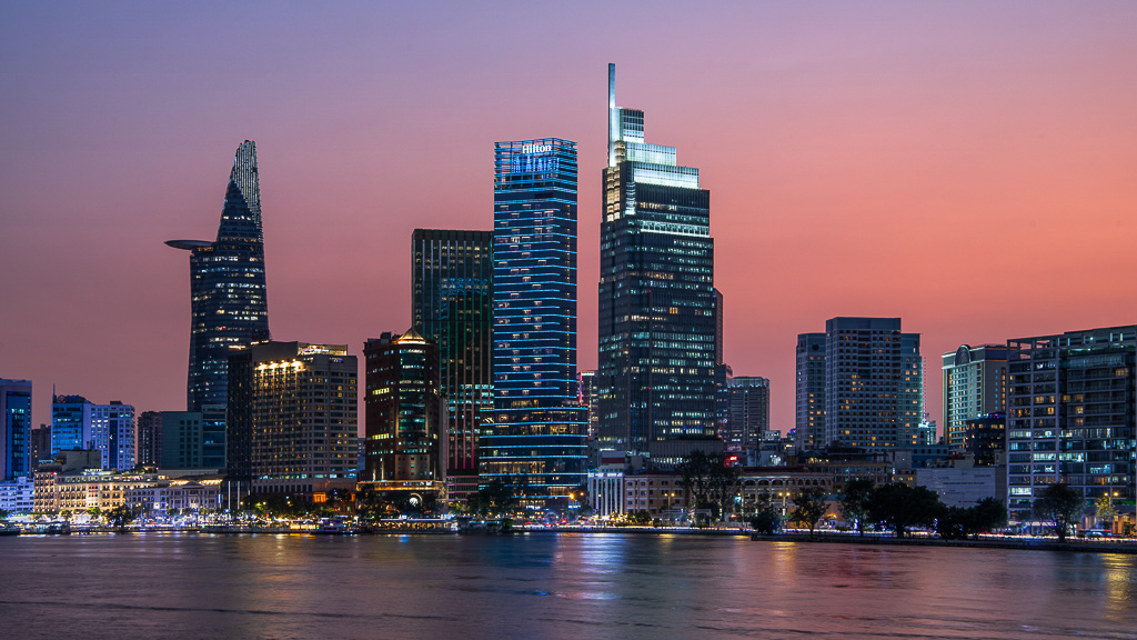 A city skyline at sunset.
