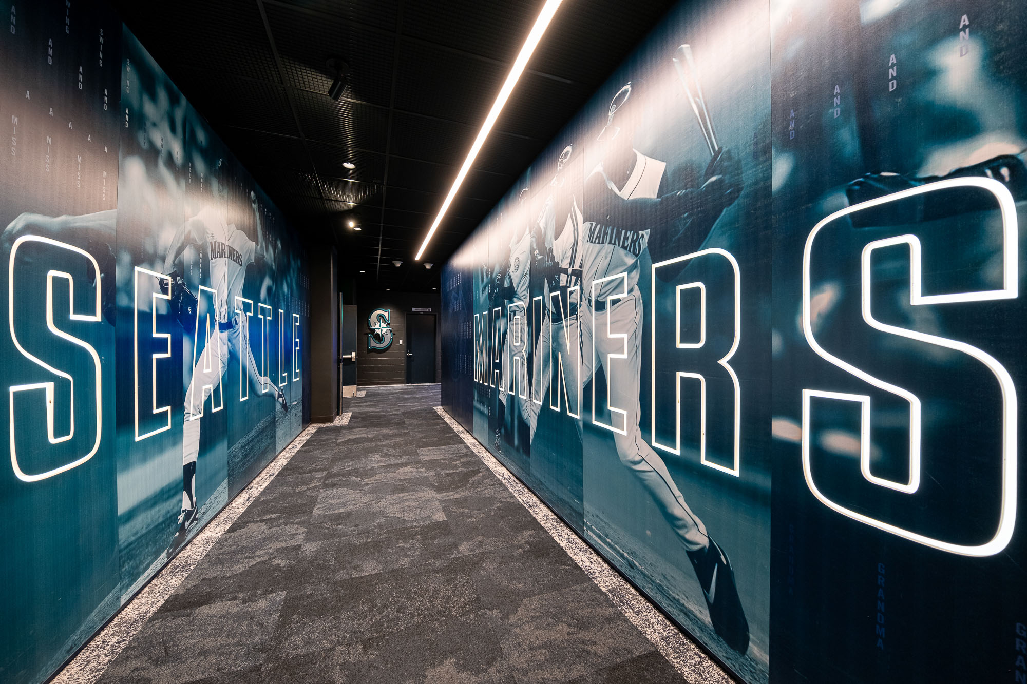 A hallway with blue and white text.