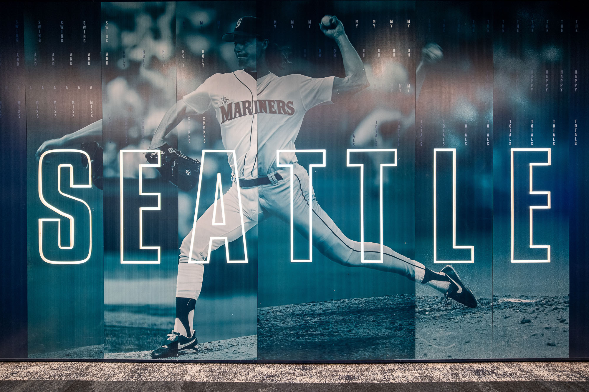 A baseball player holding a bat.