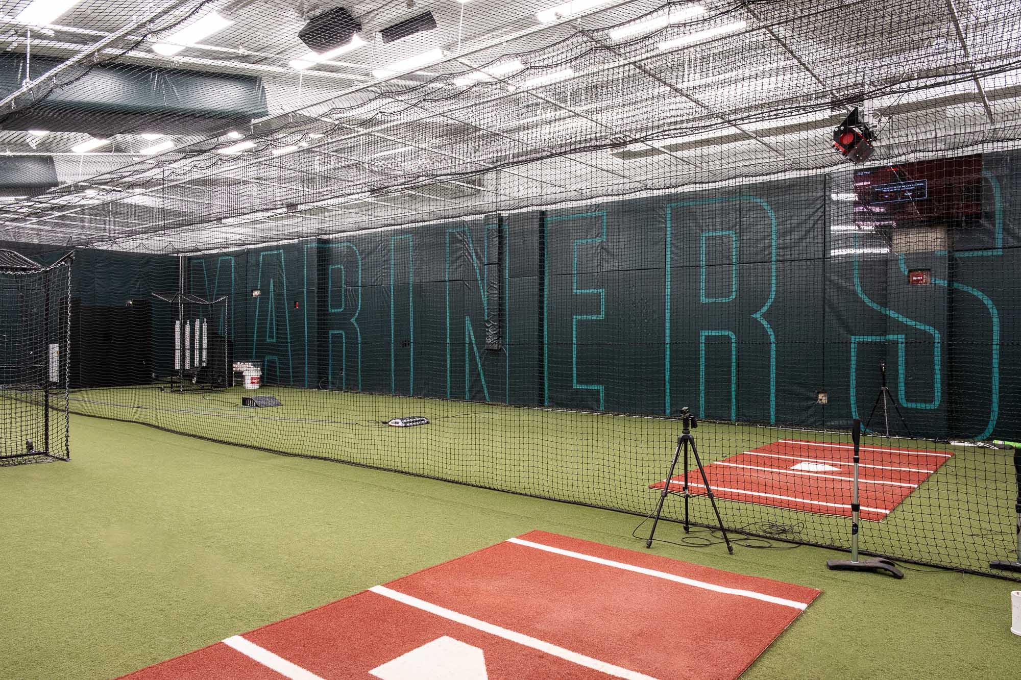 A tennis court with a large crowd.