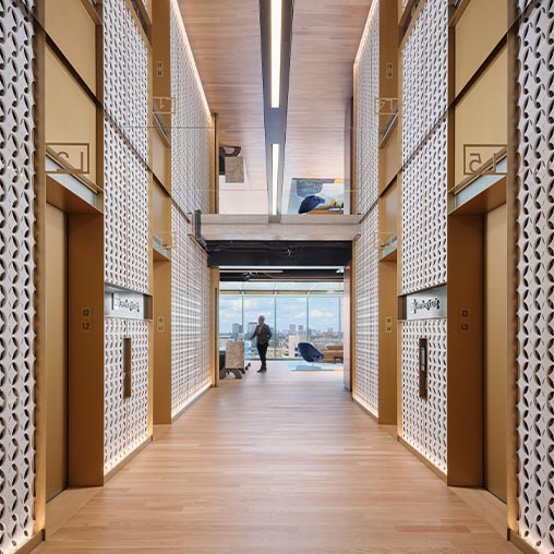 A person walking in a hallway.