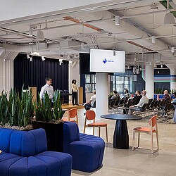 A group of people in a room.