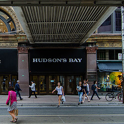 People walking on the sidewalk.