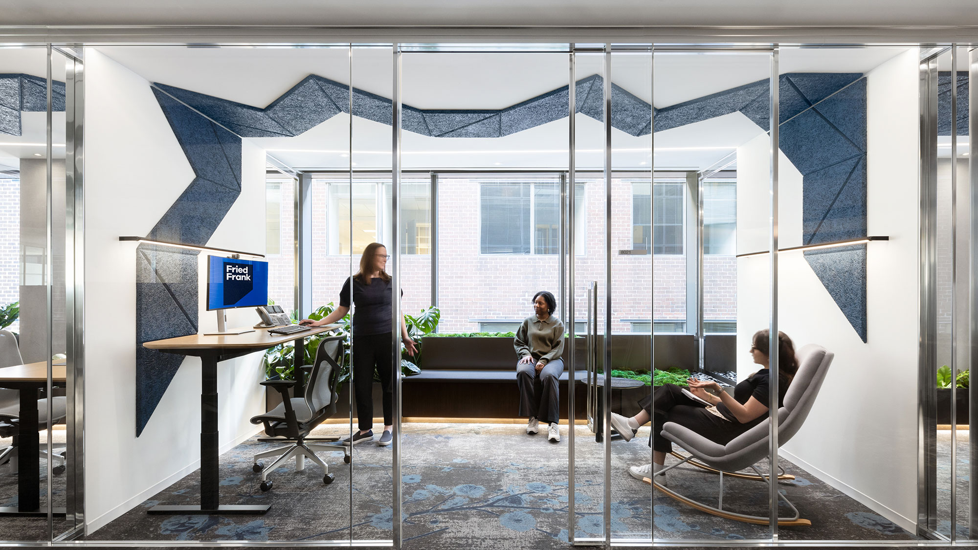 A group of people in an office.