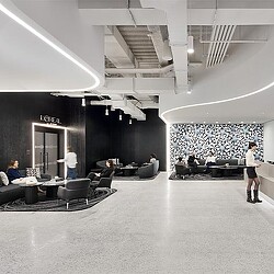 A group of people in a room.