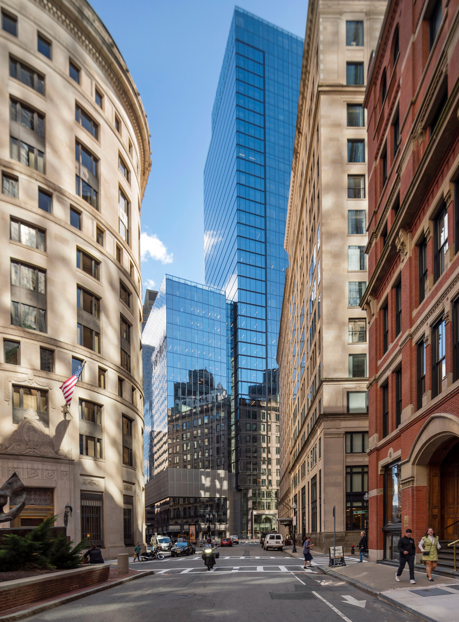 A city street with tall buildings.