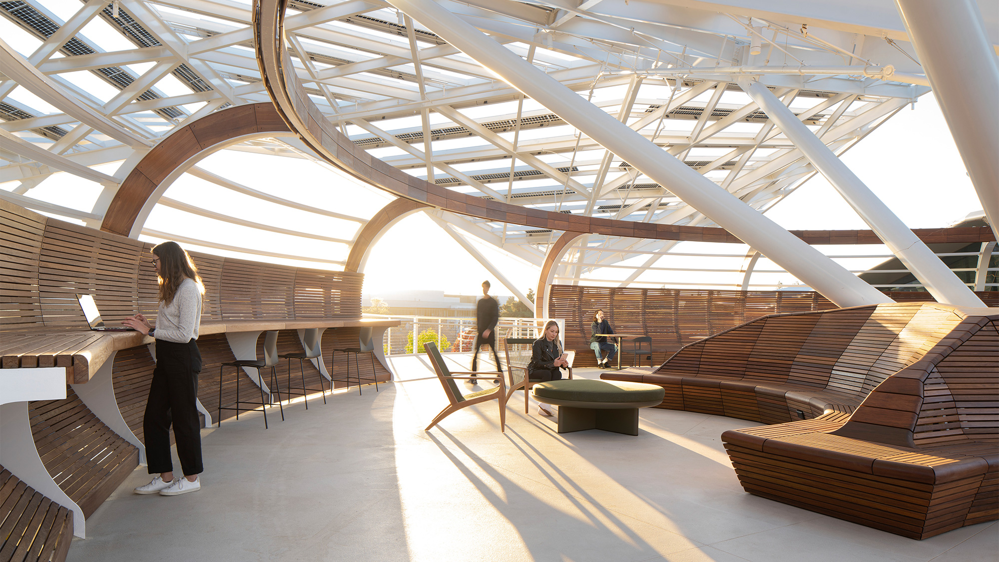 A person standing in a large room.