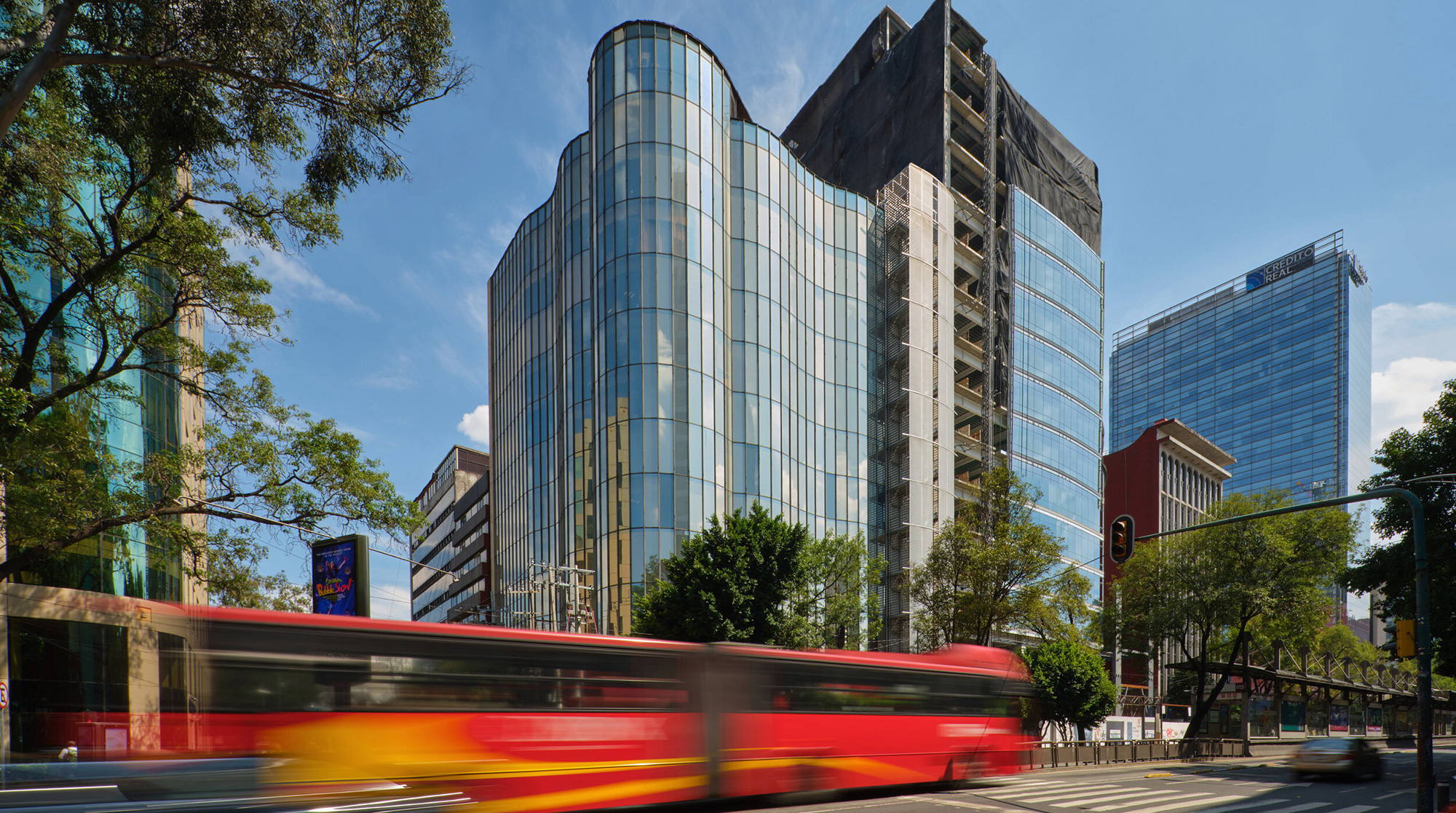 A city street with tall buildings.