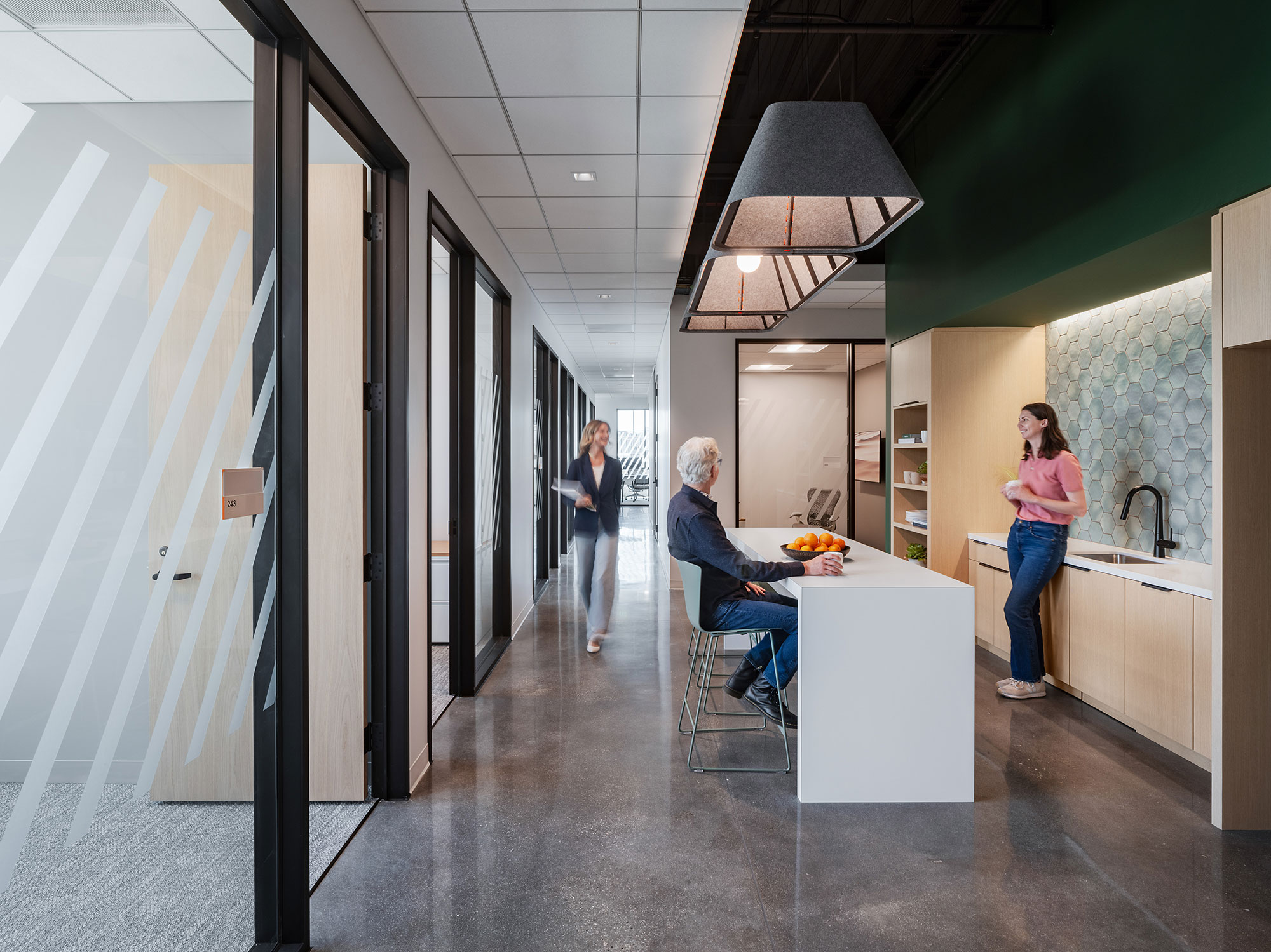 A group of people in a room.