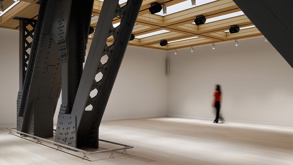 A person walking in a large room.