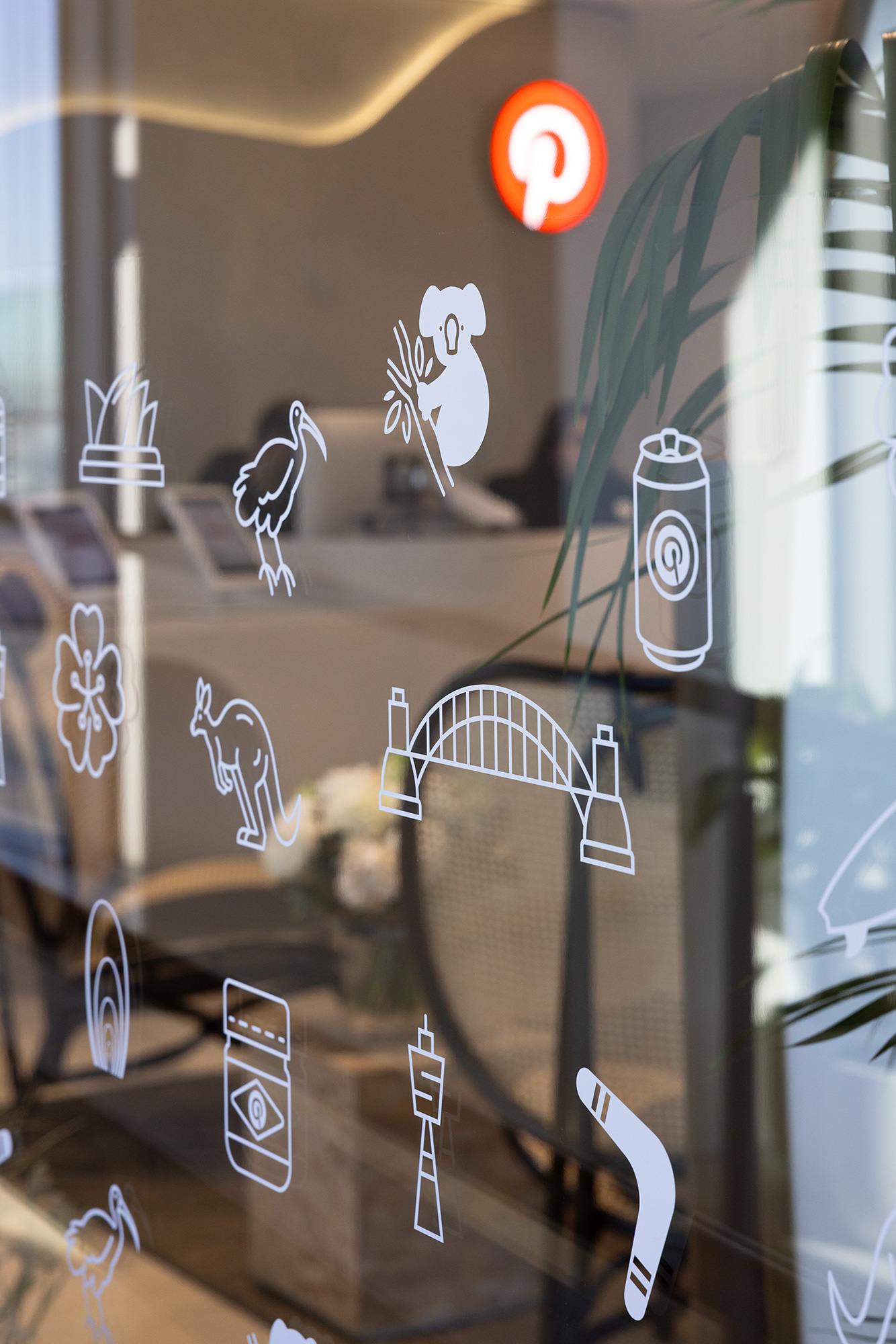 A glass display case with a plant.