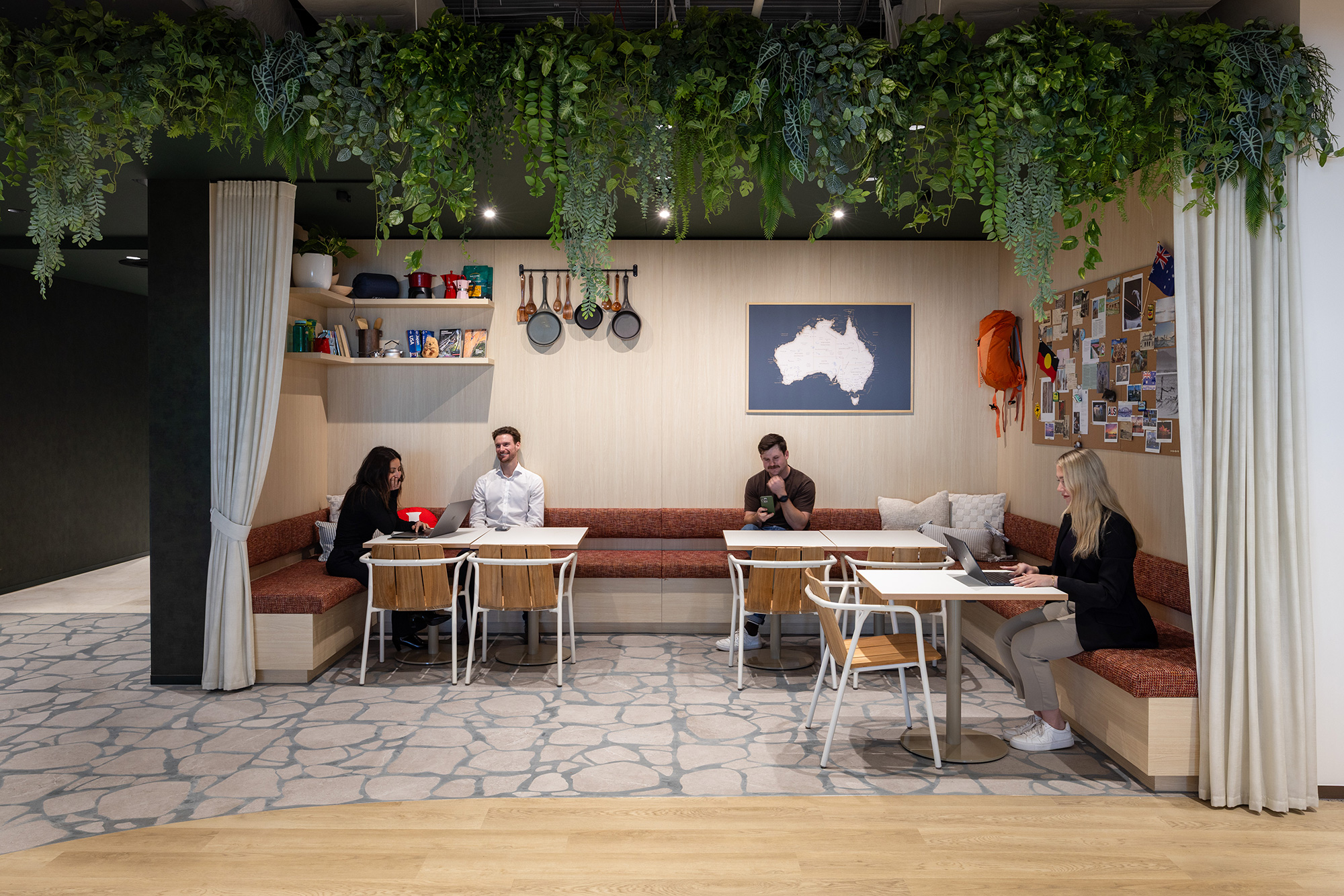 A group of people sitting at a table.