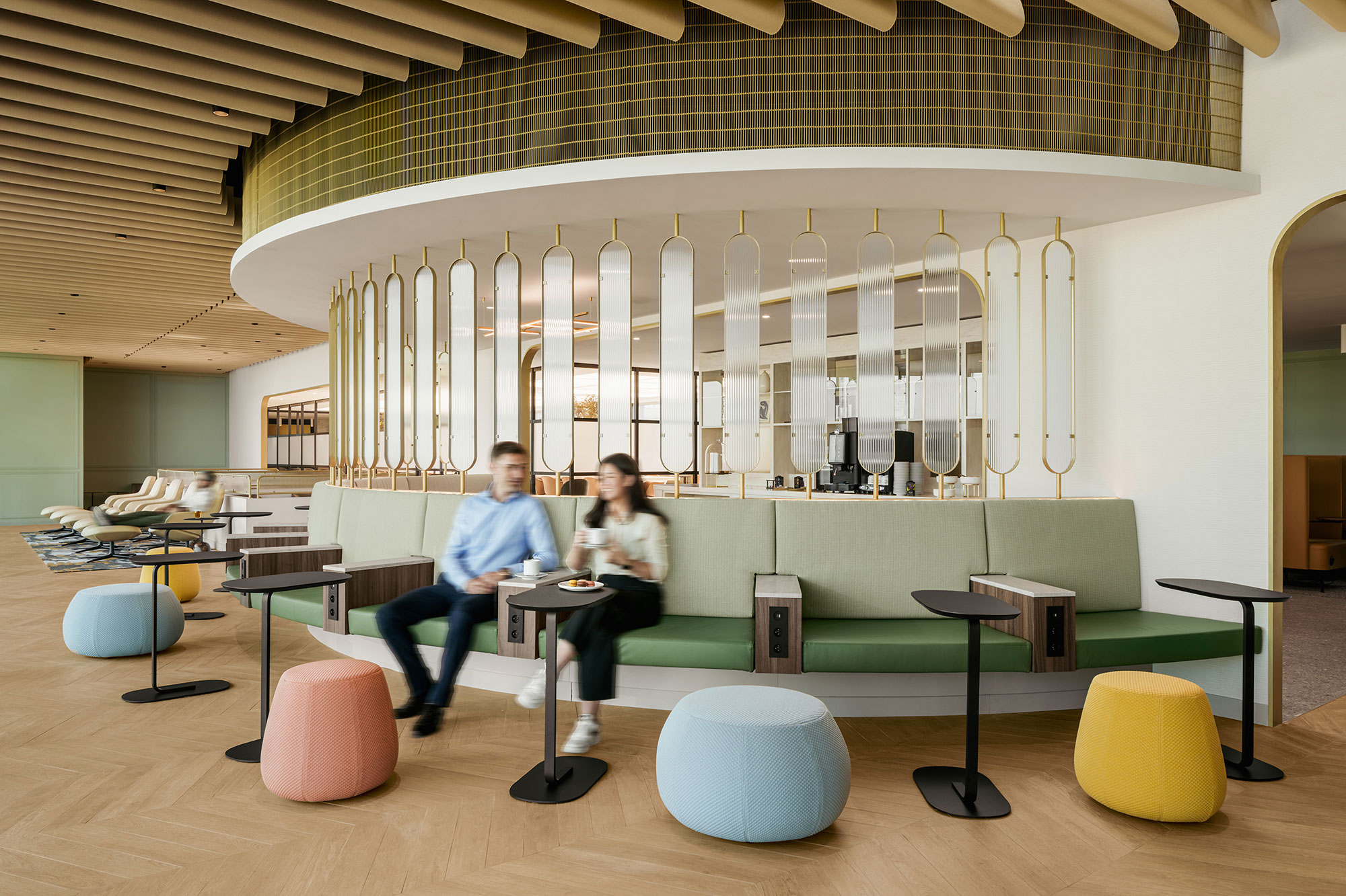 A few people sitting in a room.